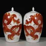 Pair of Iron Red Porcelain Ginger Jars with Lion Motif (1)